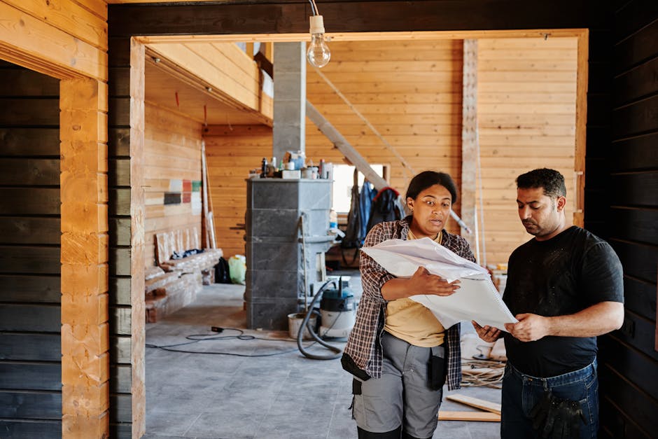 Professional kitchen renovation team working on custom cabinets